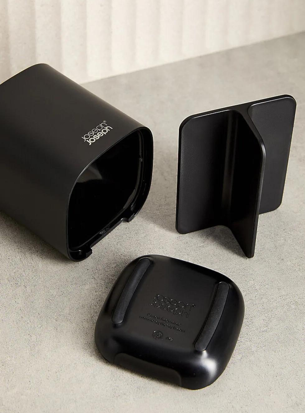 Small black toothbrush holder