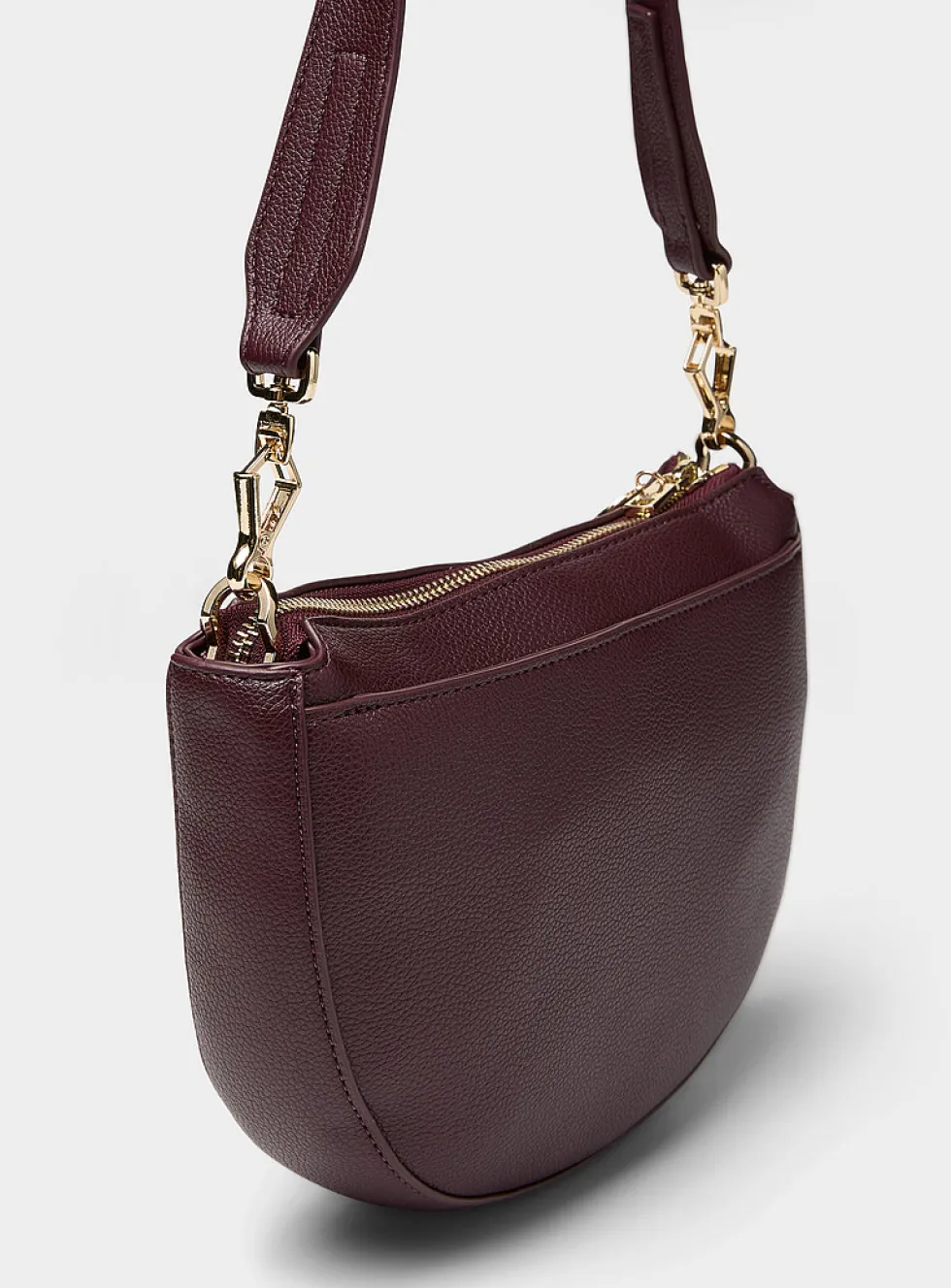 Textured half-moon crossbody bag