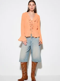 Tie-front and ruffled-edge sheer chiffon blouse