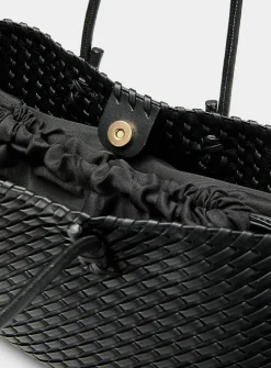 Tubular handle braided baguette bag