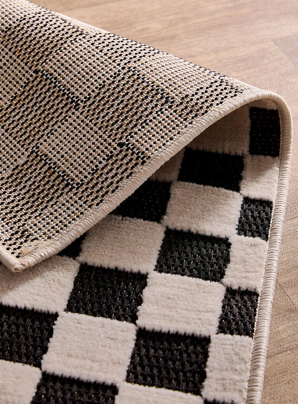 Two-texture checkerboard outdoor rug