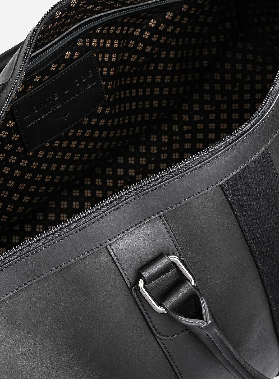 Vegetable-tanned leather duffle bag