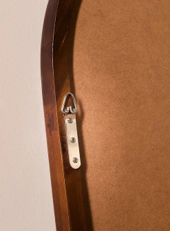 Walnut-finished arched frame mirror
