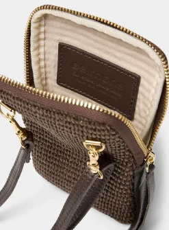 Woven straw and leather phone clutch